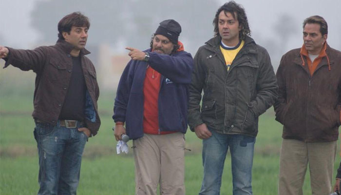 Director Anil Sharma shares a throwback pic from sets of 'Apne', On Occasion of Dharmendra's 85th Birthday!